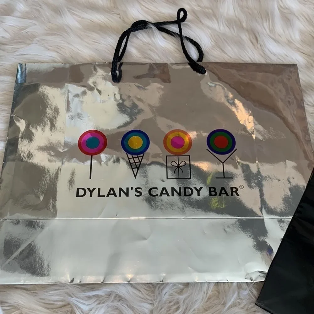 Dylan’s Candy Bar Paper Shopping Bags. One Black and One Silver Metallic.